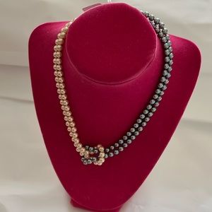 Vintage Majorica pearls. The clasp is torsade.